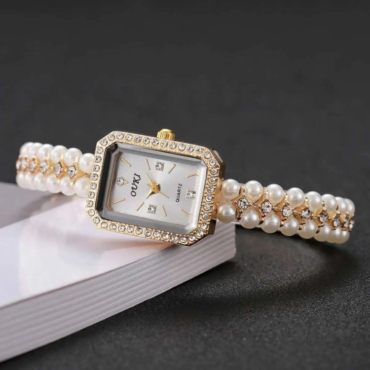 Жіночий годинник OUKI gold - 